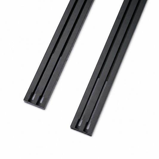 Twin accessory channels on two black 1450 roof rail cross bars