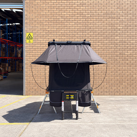 Front view of the CZY AIR rooftop tent, ladder and bags on the original ToughBuilt sawhorses and timber frame.