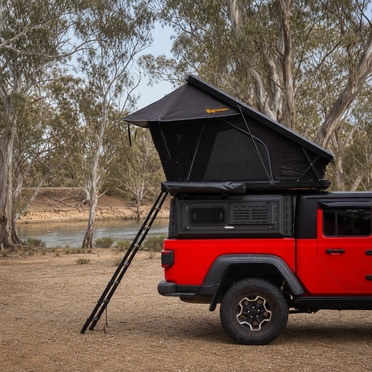 Older Version Overland X 1380 rooftop tent side view at a Murray River campsite