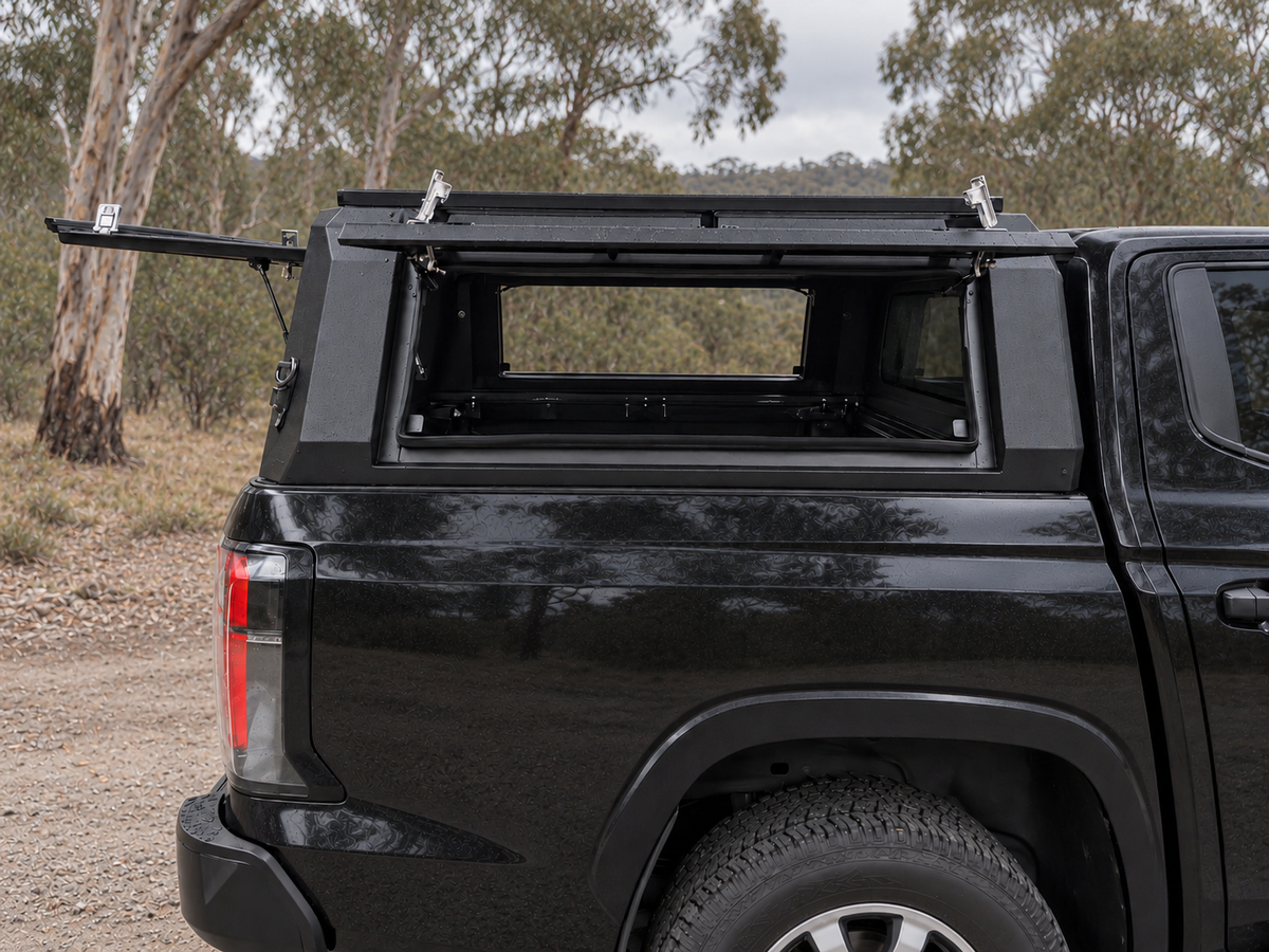 CZY Trade Canopy side hatches open at a High Country campsite, showing access through the tub