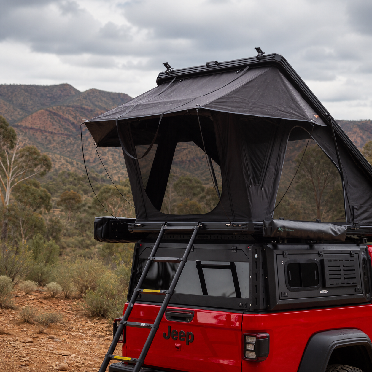 Older Version Overland X 1380 rooftop tent rear-side view at a Flinders Ranges campsite