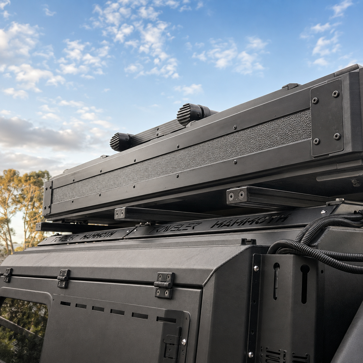3060 HD aluminium cross bars installed beneath a rooftop tent