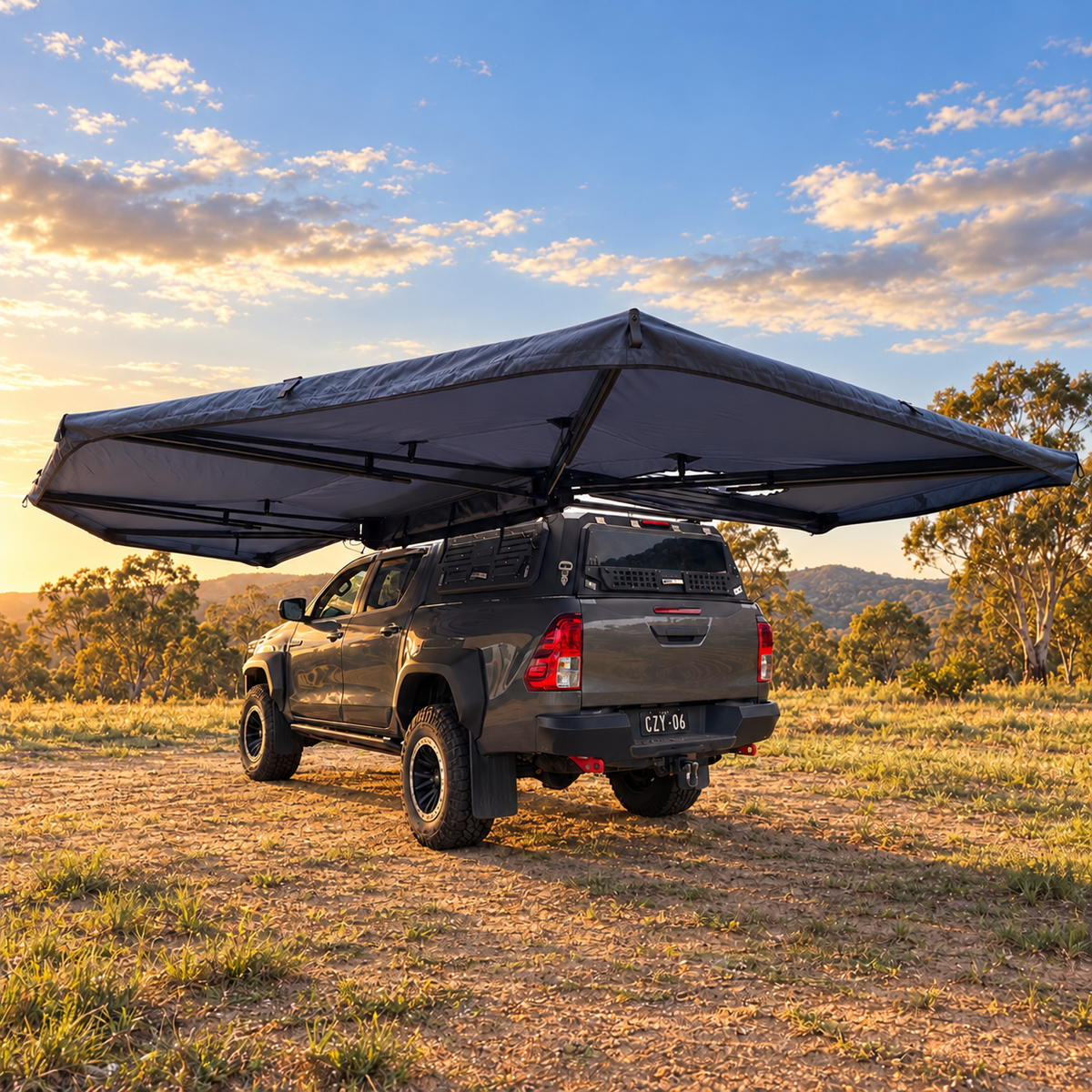 XL 270+ Awning opened beside and behind a ute at sunset