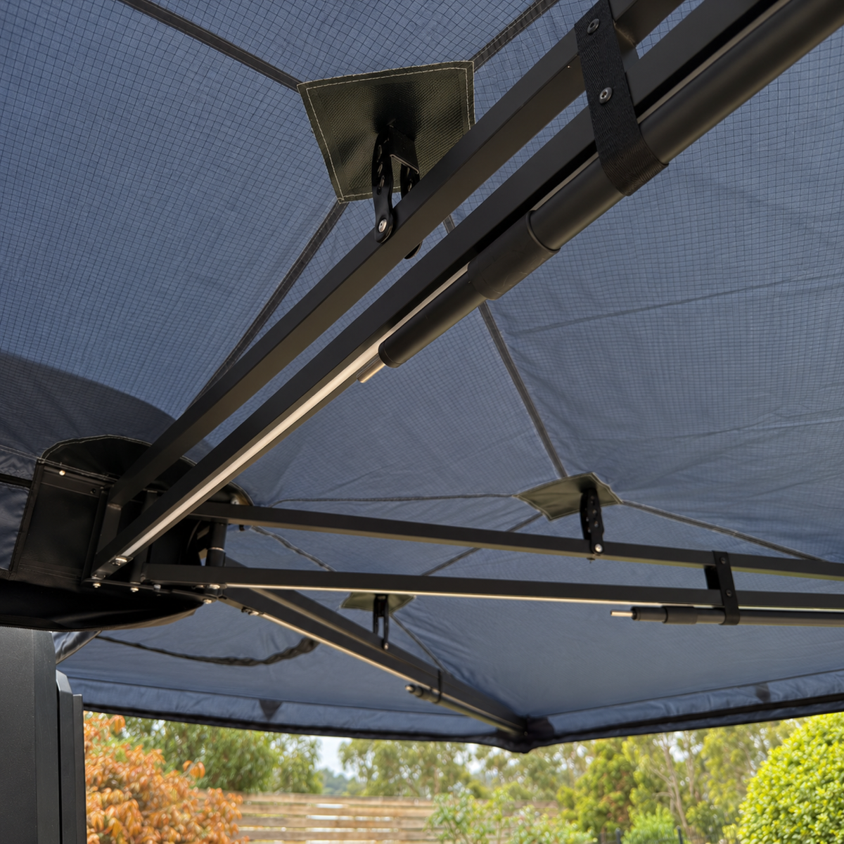XL 270+ Awning underside showing support arms and canopy attachment points