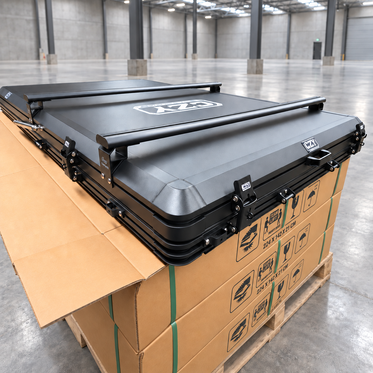 CZY TrailReady 1310 closed hard shell top detail with roof crossbars and stainless steel gas strut